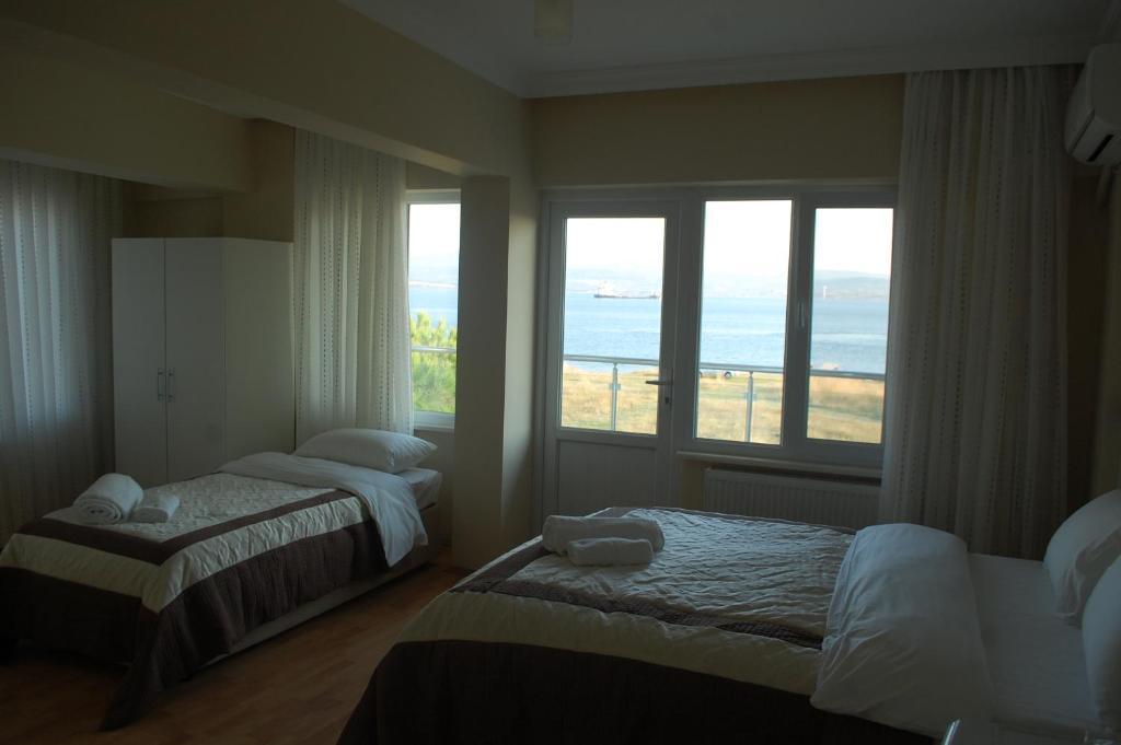 Flora Hotel Burhanli Habitación foto